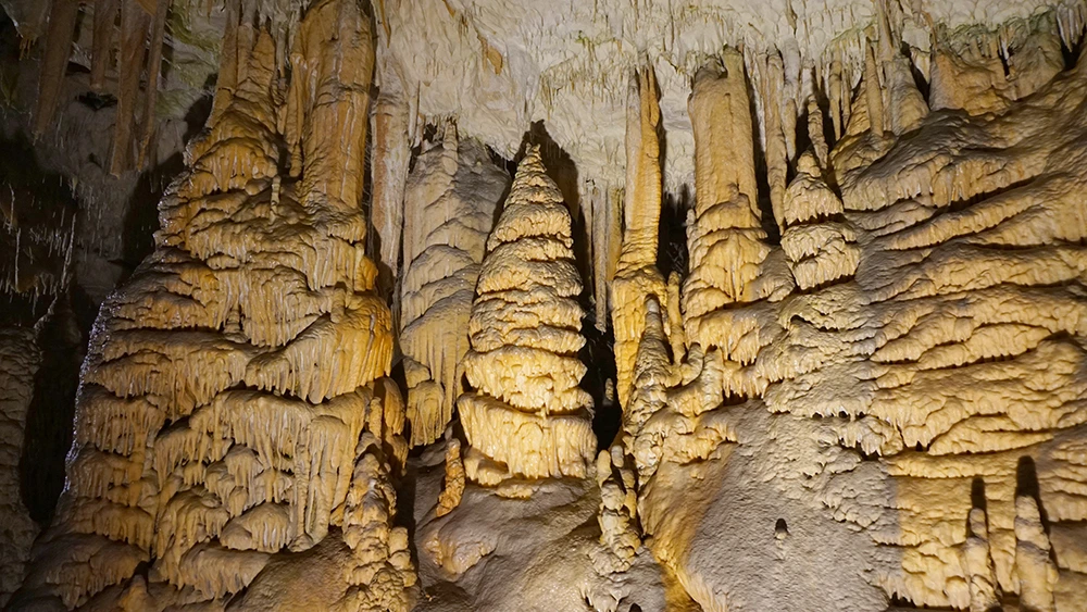 Underground train drive inside Postojna Cave
